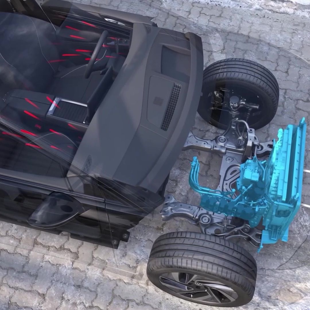 Ilustrácia automobilu s priehľadnou karosériou, ktorá odhaľuje mechaniku pod ňou. Vidieť prednú nápravu, kolesá a modro zvýraznené tepelné čerpadlo. Čiastočne je viditeľné aj vnútorné vybavenie vozidla.