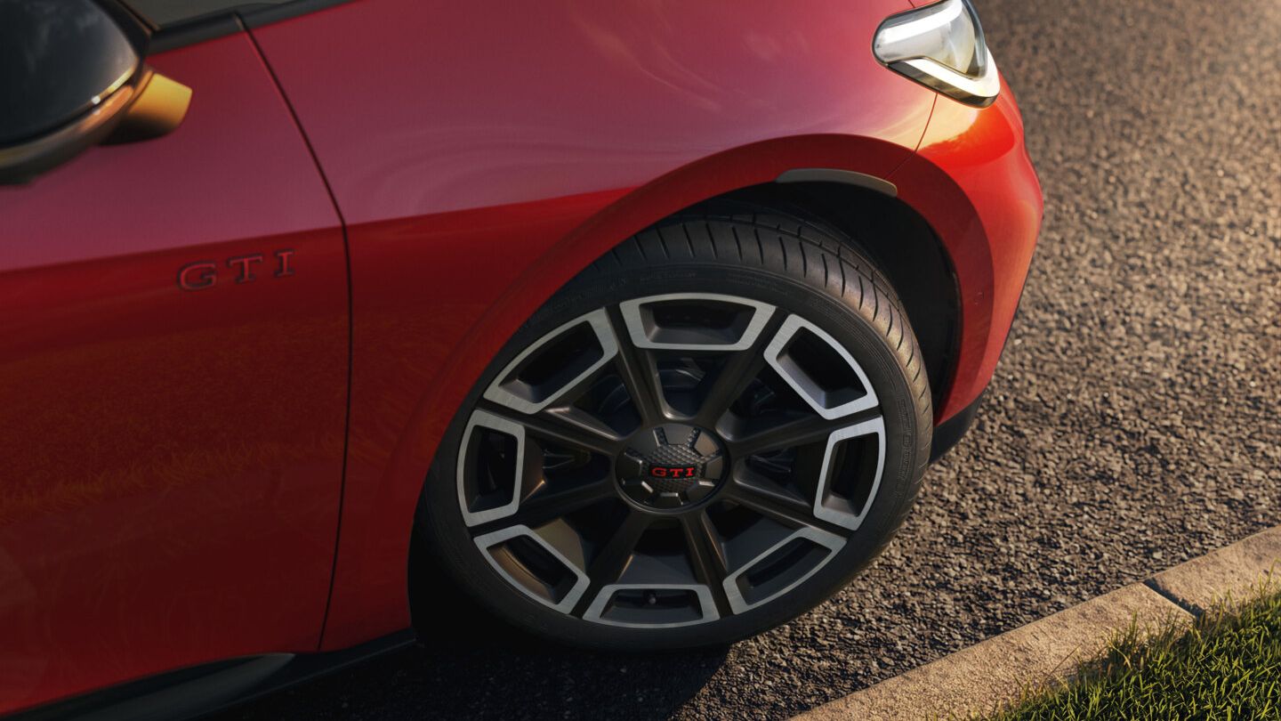 [AI-modified] – Detail disku červeného VW ID.3 GTI.