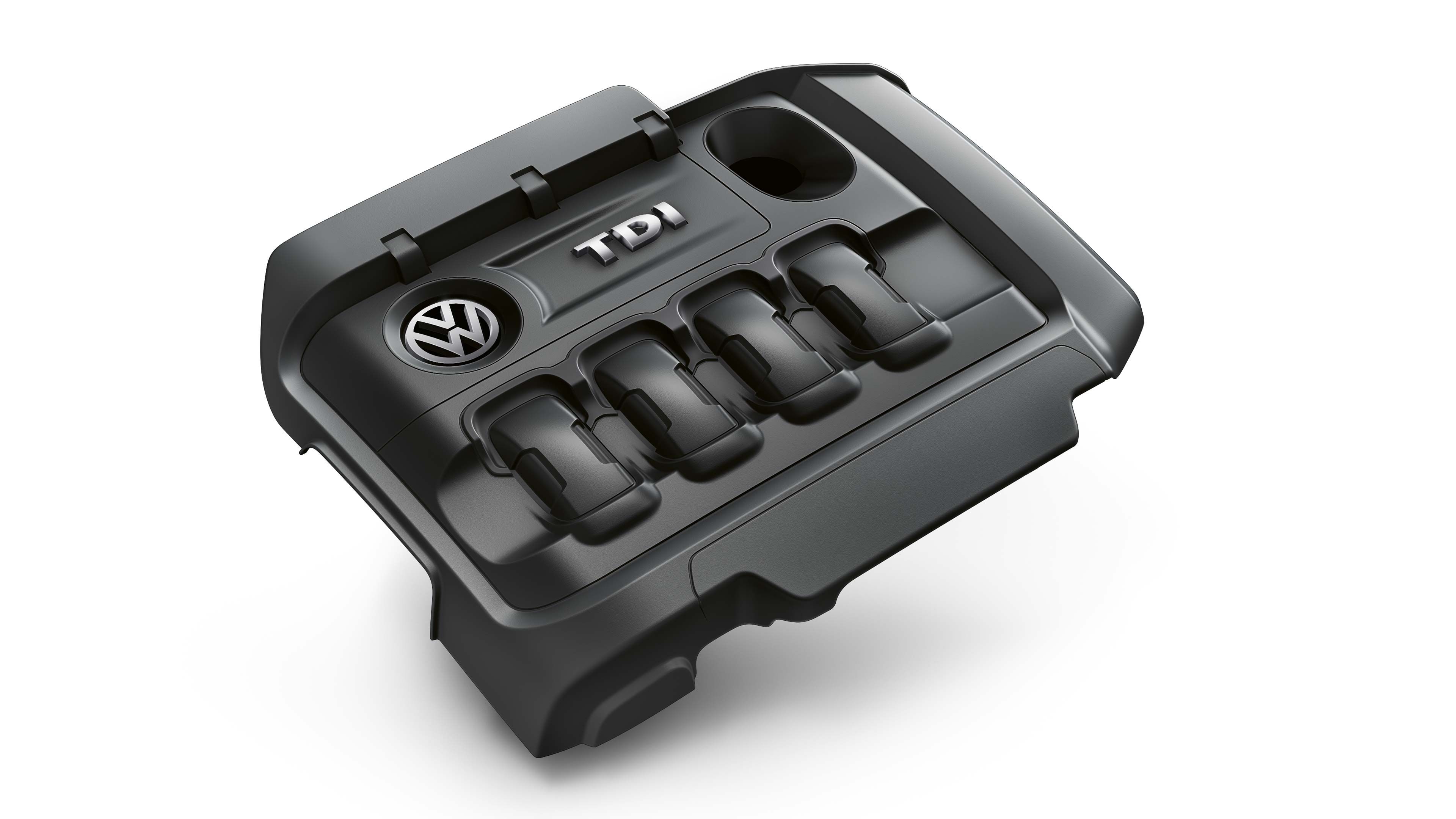 Čierny kryt motora s logom Volkswagen a označením TDI. Kryt je určený pre turbodieselové motory tejto značky.
