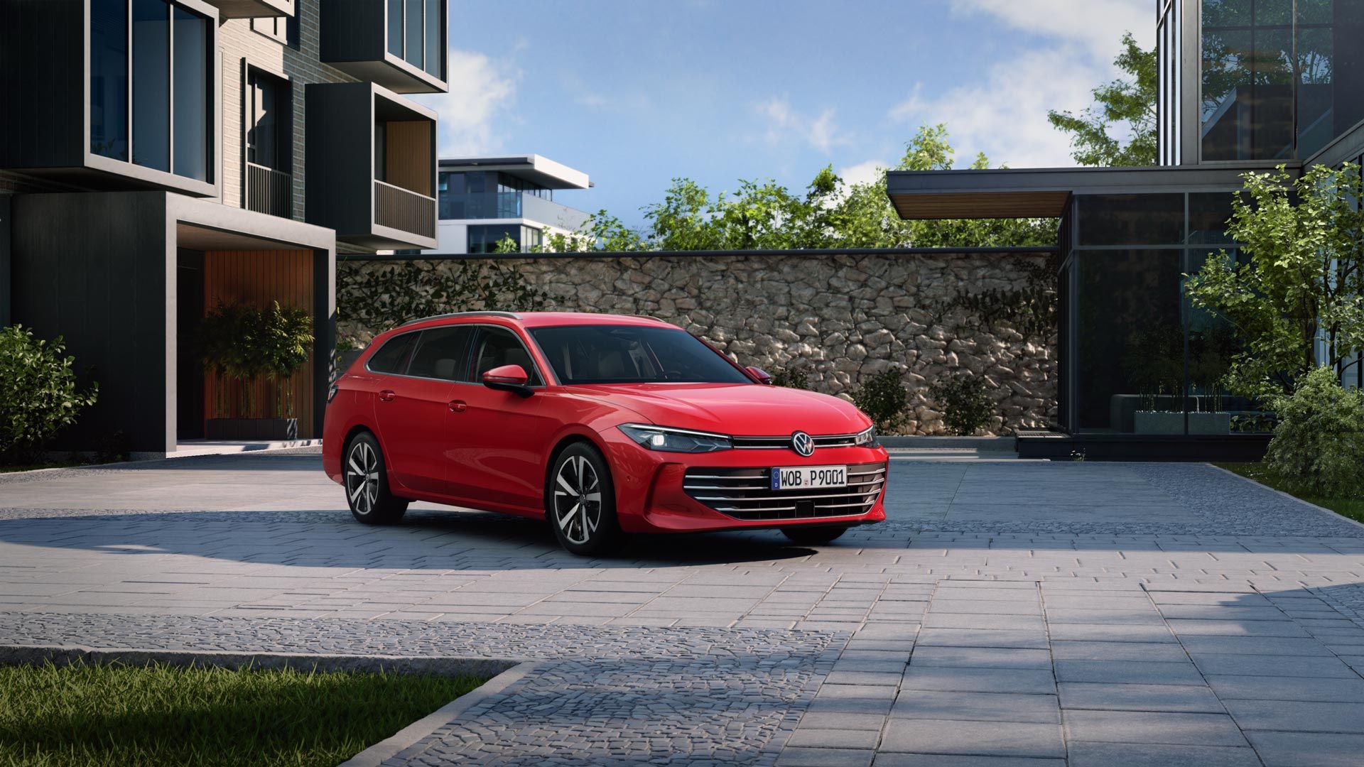 Červený VW Passat stojí na parkovisku pri modernom bytovom dome. Vozidlo je zaparkované na dlažobných kockách.