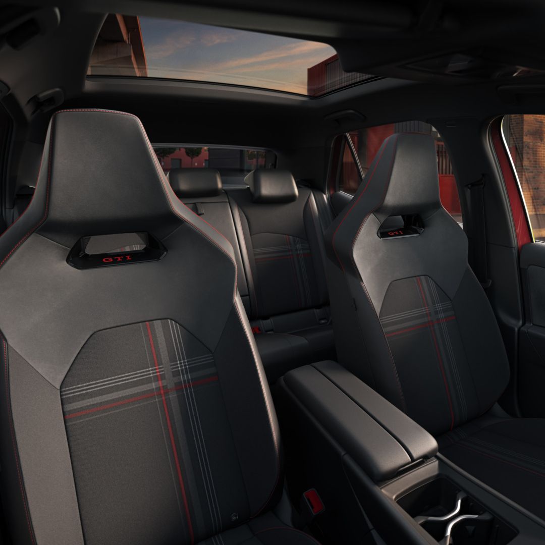 [AI-modified] – Pohľad na predné sedadlá VW ID.3 GTI s karovaným vzorom GTI